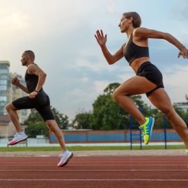 side-view-woman-man-running-track